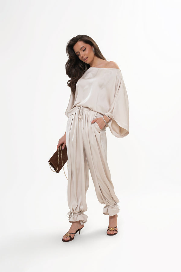 Komplet na wesele ze spodniami — co wybrać zamiast sukienki?