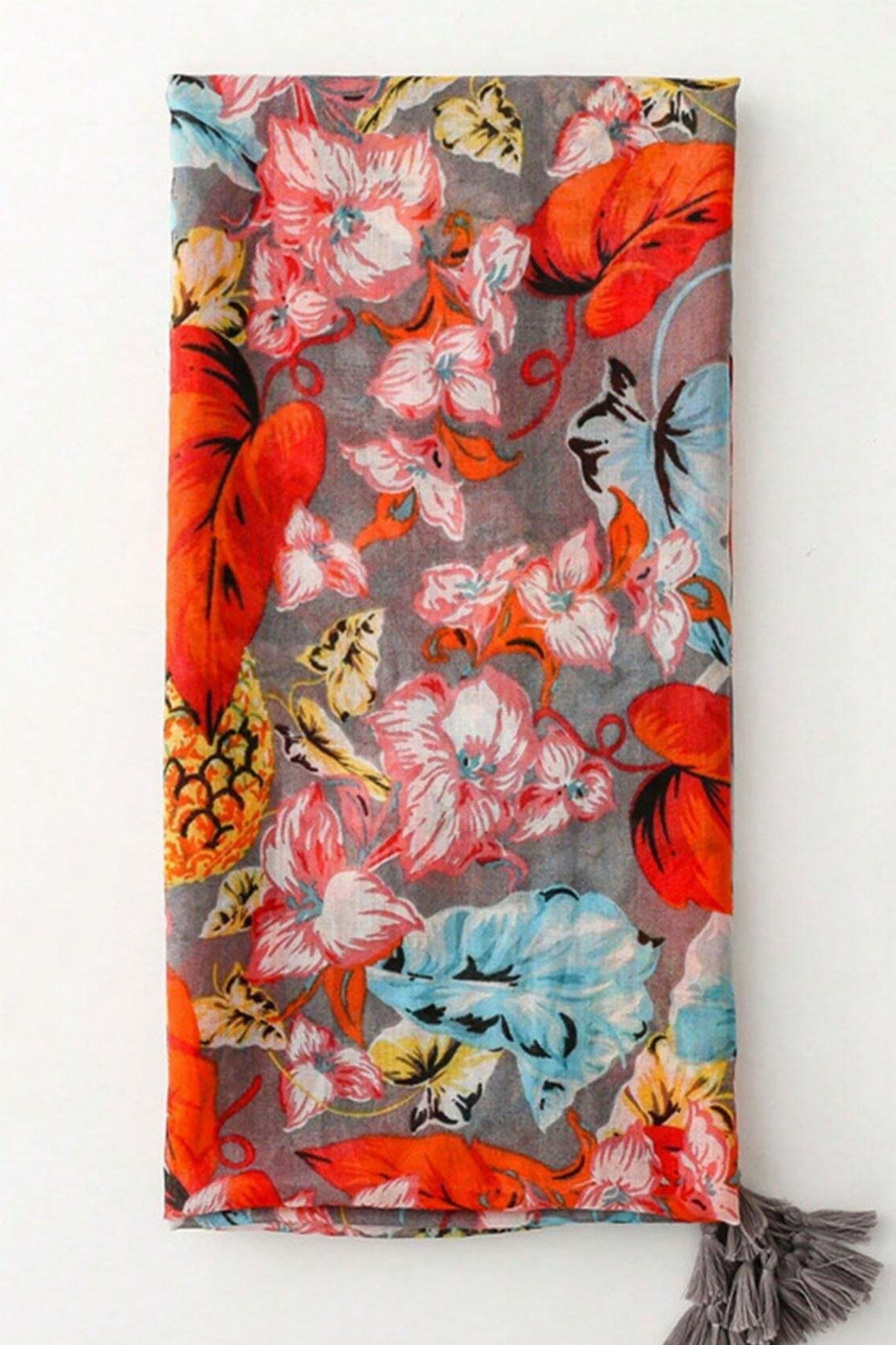 Przód szala z egzotycznym nadrukiem w czerwieni, błękicie, żółci i zieleni | KAMEA | Spironik.pl