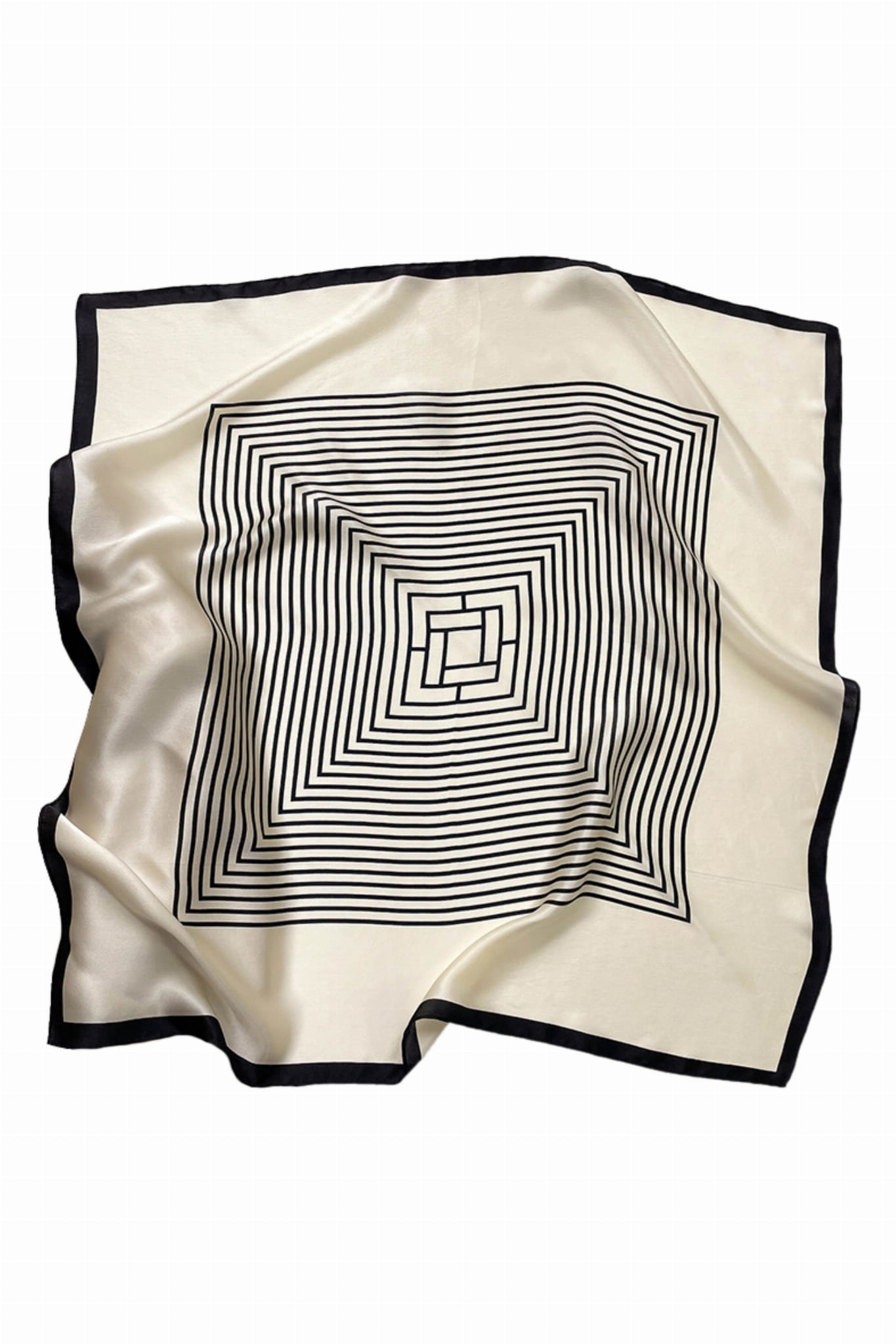 Detal jedwabnej apaszki z symetrycznym wzorem geometrycznym na kremowym tle | KAMEA | Spironik.pl