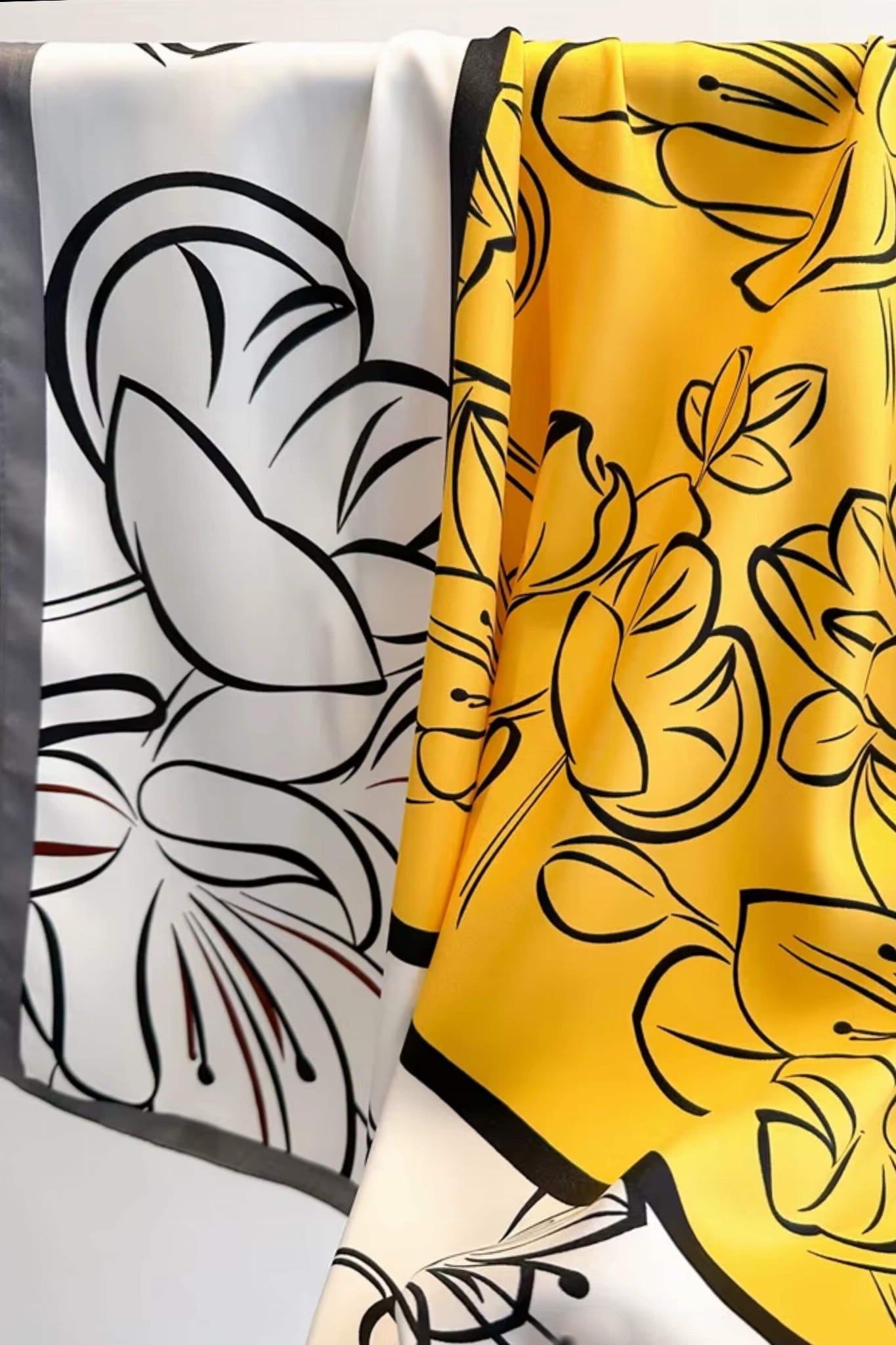 Bok apaszki z widocznym połączeniem bieli, żółci i czerni, idealnej na wiosenno-letnie dni | KAMEA | Spironik.pl