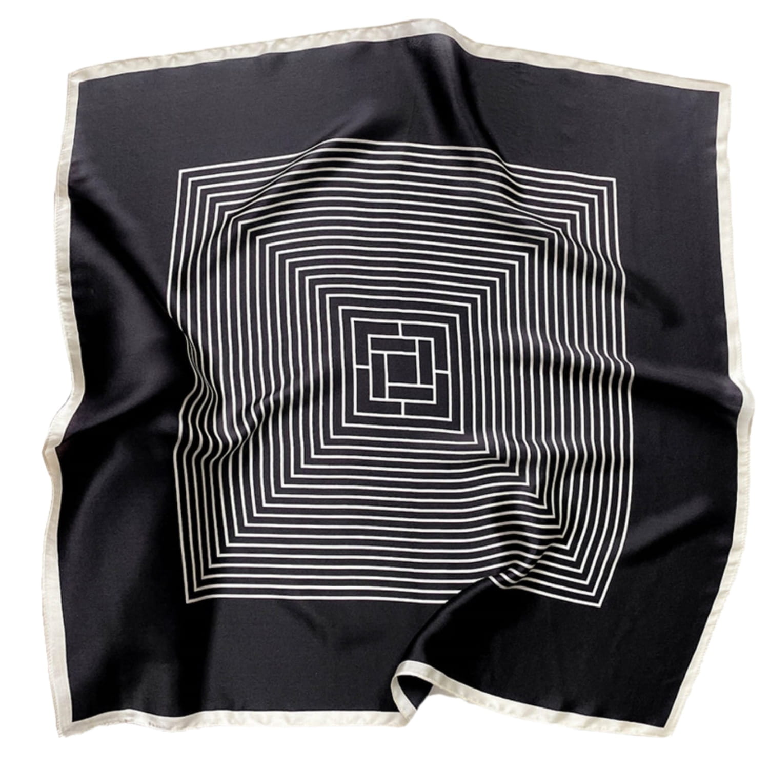 Apaszka w użyciu jako ozdoba torebki, podkreślająca elegancję i nowoczesny design stylizacji | KAMEA | Spironik.pl