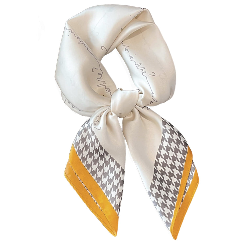 Apaszka w użyciu, stylowo zawiązana na szyi, łącząca klasykę z nowoczesnym akcentem w miejskim looku | KAMEA | Spironik.pl