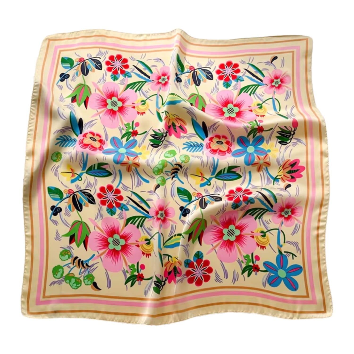 Apaszka satynowa z kwiatowym wzorem leżąca na stole, ukazująca jej delikatność i kolorystykę | KAMEA | Spironik.pl