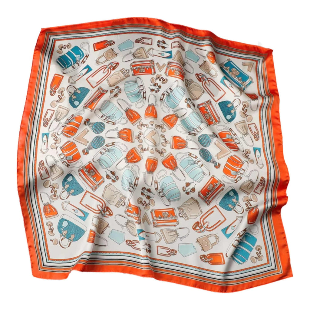 Apaszka w użyciu jako dodatek do torebki, podkreślająca modny wygląd i osobisty styl | KAMEA | Spironik.pl