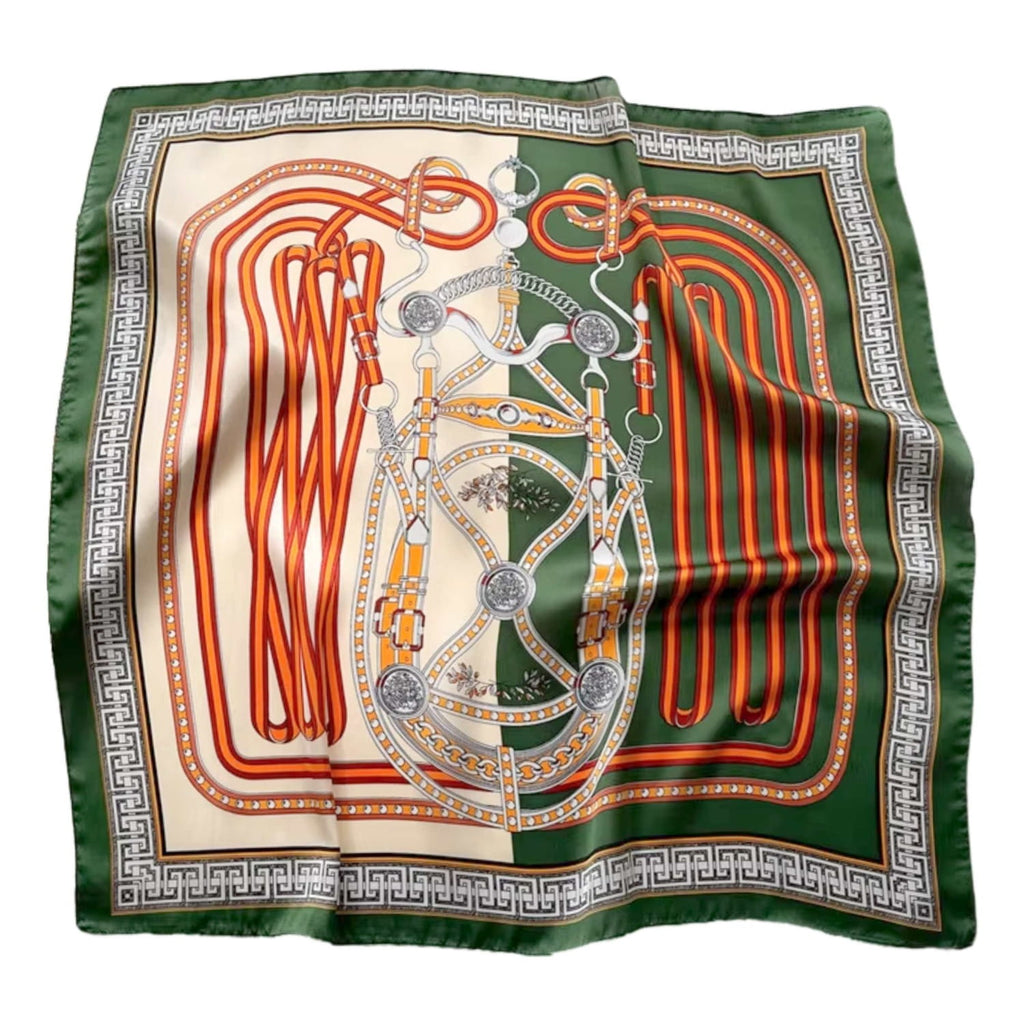 Apaszka w użyciu jako ozdoba torebki, prezentująca elegancki styl i kolorystykę | KAMEA | Spironik.pl