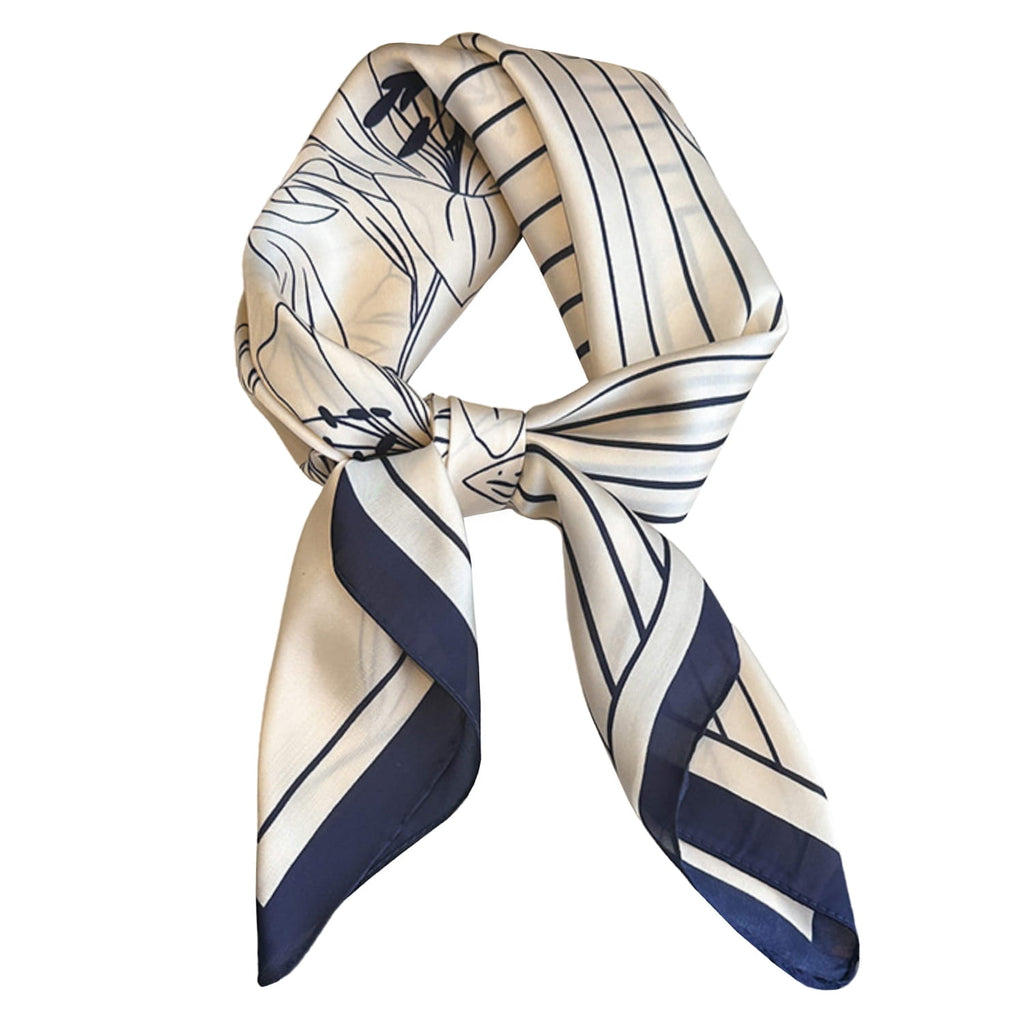 Wzór apaszki z geometrycznymi liniami i liliami, zbliżenie na fakturę satynowego materiału | KAMEA | Spironik.pl