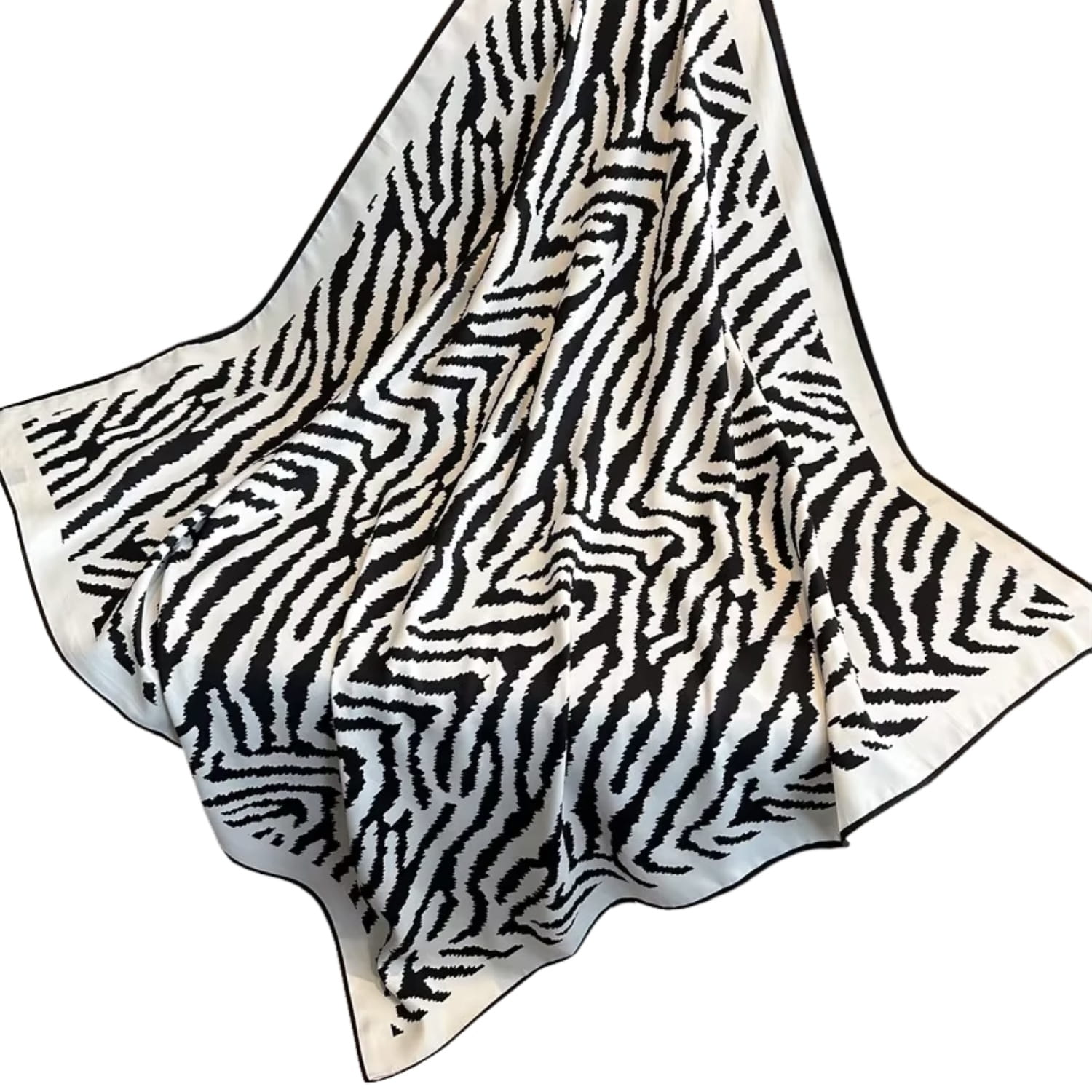 Apaszka w pełnej skali, leżąca na stole, podkreślająca nowoczesny styl i odważny wzór | KAMEA | Spironik.pl