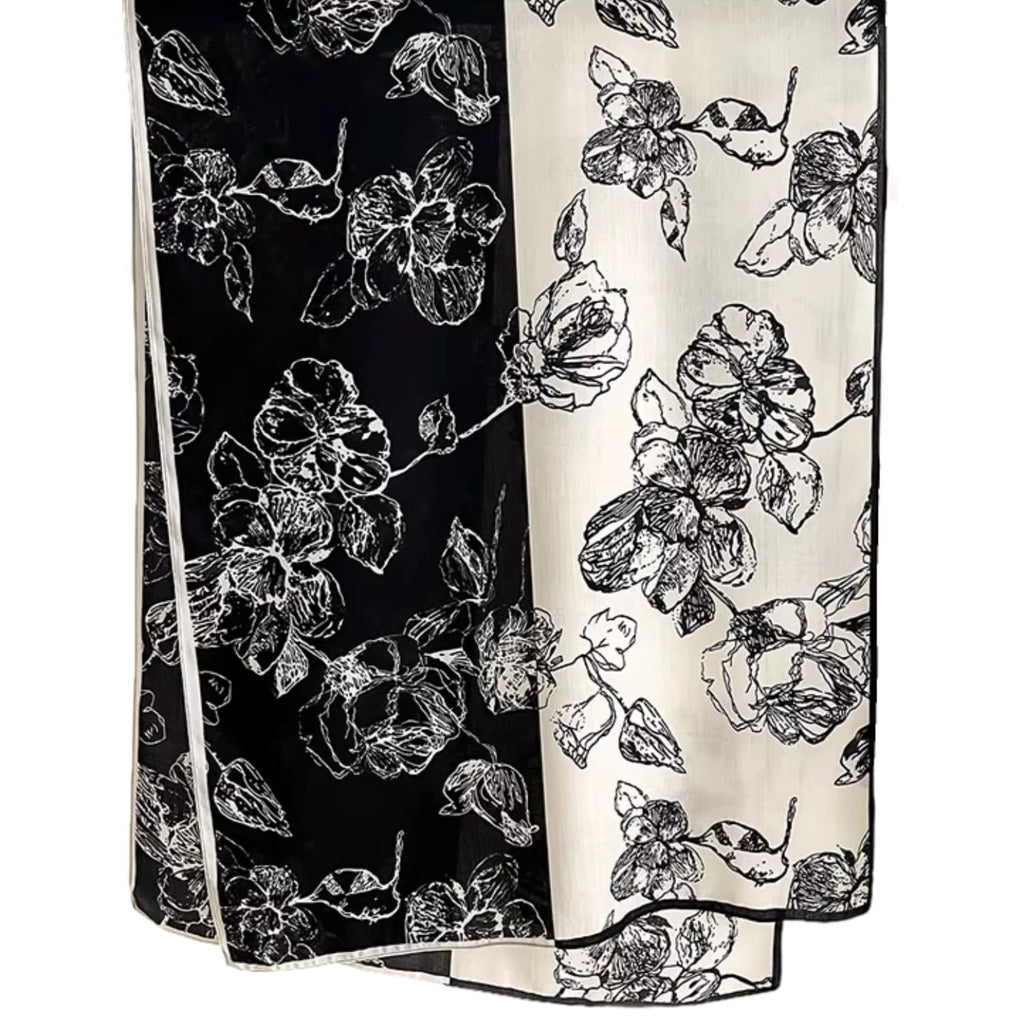 Černo-ecru šál v použití, dodávající eleganci každodenním a večerním stylizacím | KAMEA | Spironik.pl