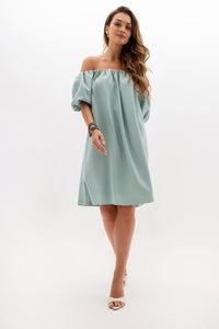 A midi dress with elastic waistband and pockets. Mint color.