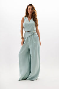 Women's trousers with a decorative belt and wide legs. Mint color
