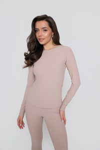 Women's long-sleeved blouse with a delicate ribbed trim - fitted, stretchy. Light beige color