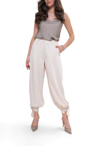 Elegant women's trousers - tie-up legs, high waist. Ecru color