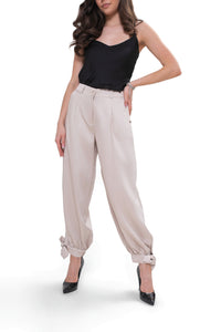 Elegant women's trousers - tied legs, high waist. Light beige color