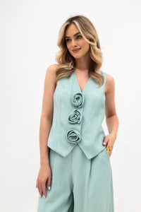 Women's vest with floral buttons - elegant, adjustable design. Mint color