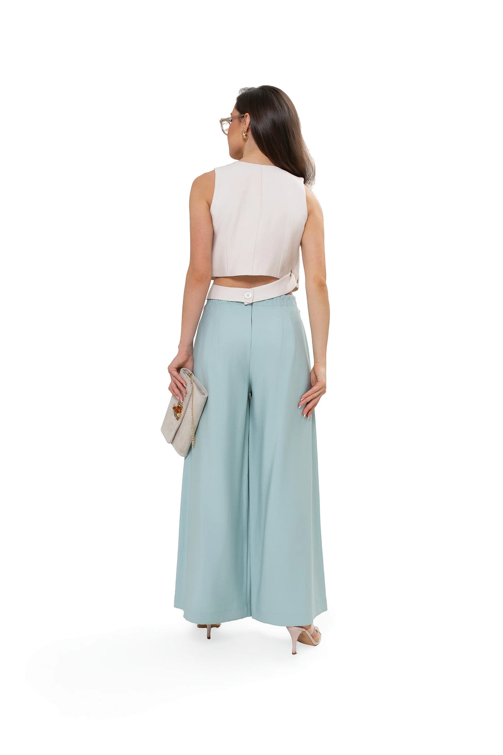 Elegante Damenweste mit Schnalle – formelle Business-Kleidung. Hellbeige.