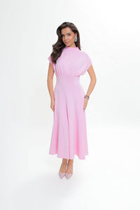 Knitted diver midi dress with a flared skirt. Pink color.