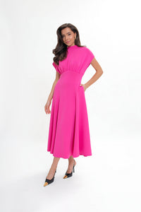 Knitted diver midi dress with a flared skirt. Raspberry color.