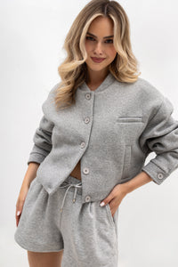 Bomber jacket with logo detailing - stand-up collar, buttons, and lining. Color: Gray melange (silver lettering)