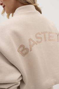 Bomber jacket with logo - stand-up collar, buttons, and lining. Color: Beige (beige lettering)
