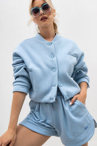 Bomber jacket with logo patch - stand-up collar, buttons, and lining. Color: Sky Blue (blue lettering)