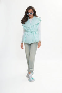 Women's quilted vest with hood and belt. Pistachio color.